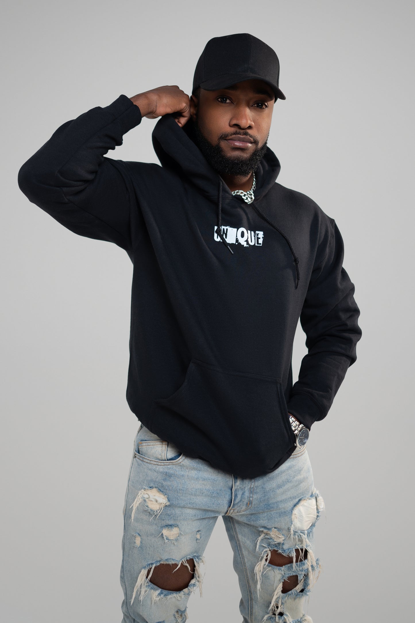 Black listed unisex mid-weight unisex hoodie. Classic fit