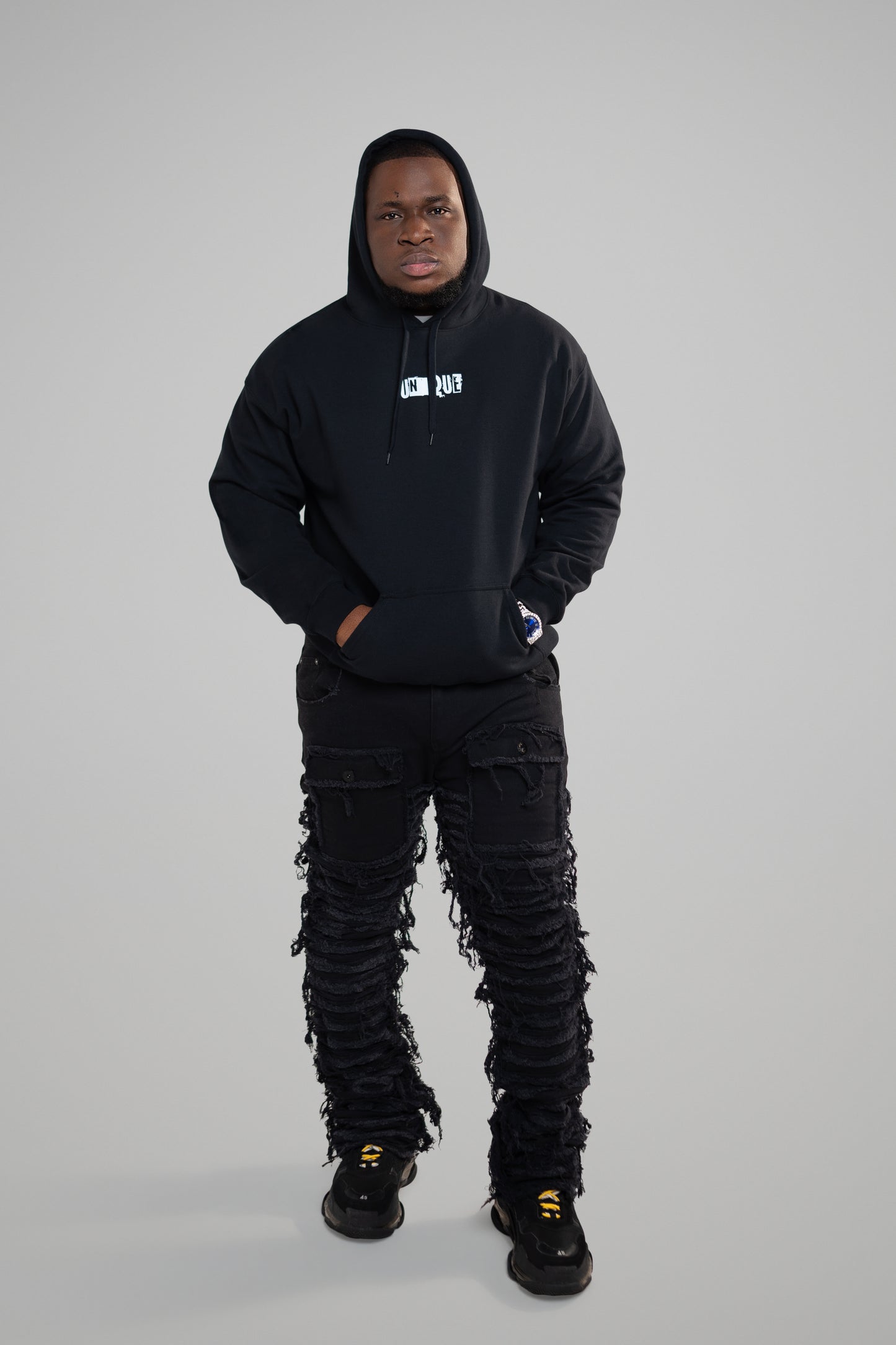 Black listed unisex mid-weight unisex hoodie. Classic fit