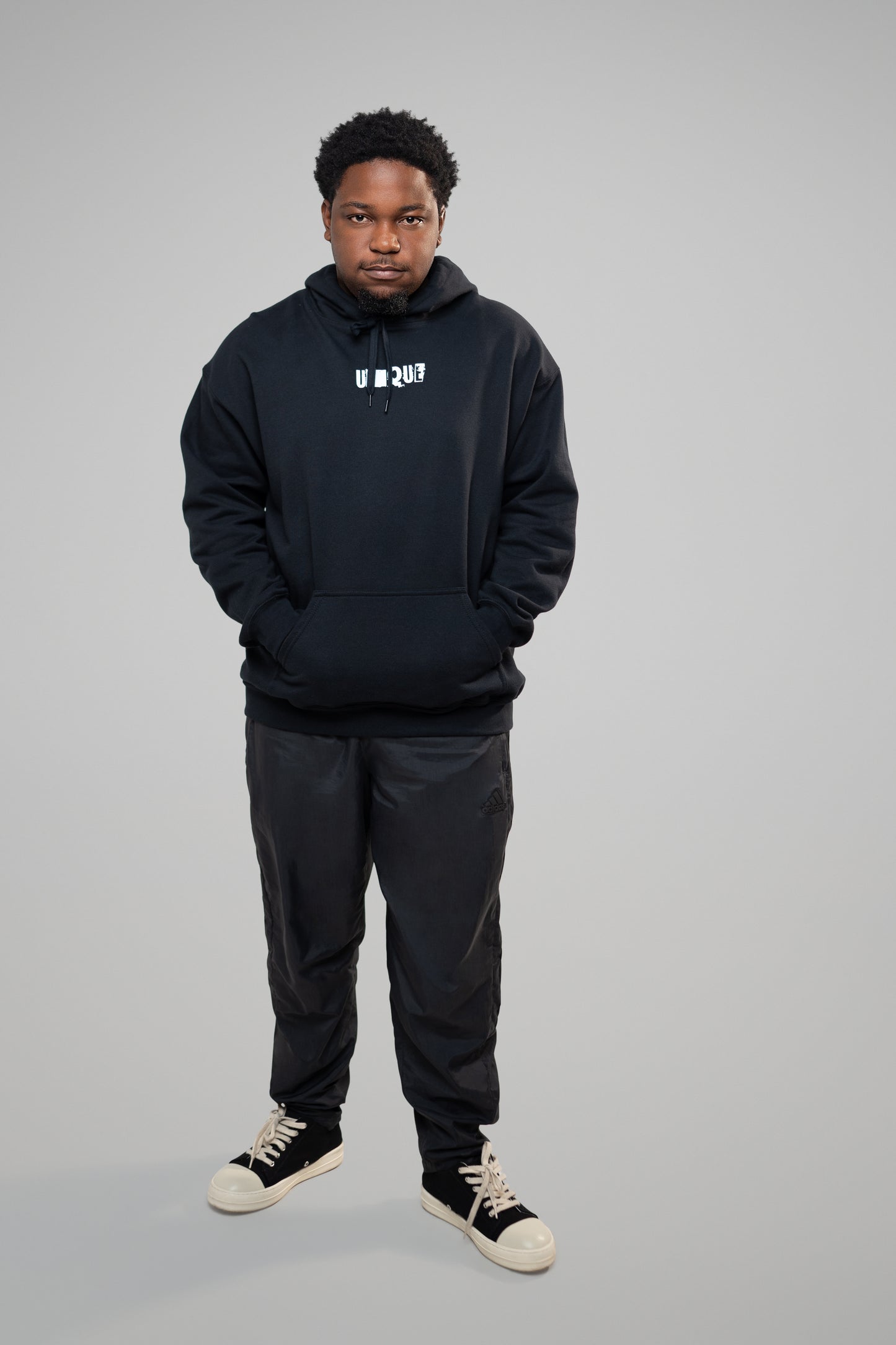 Black listed unisex mid-weight unisex hoodie. Classic fit